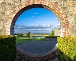View of the lake through the courtyard wall